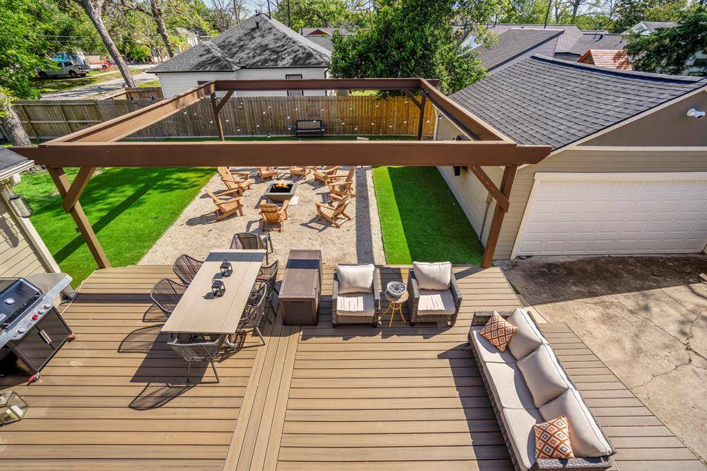 Step out to the private balcony and enjoy views of the treetops and skyline.