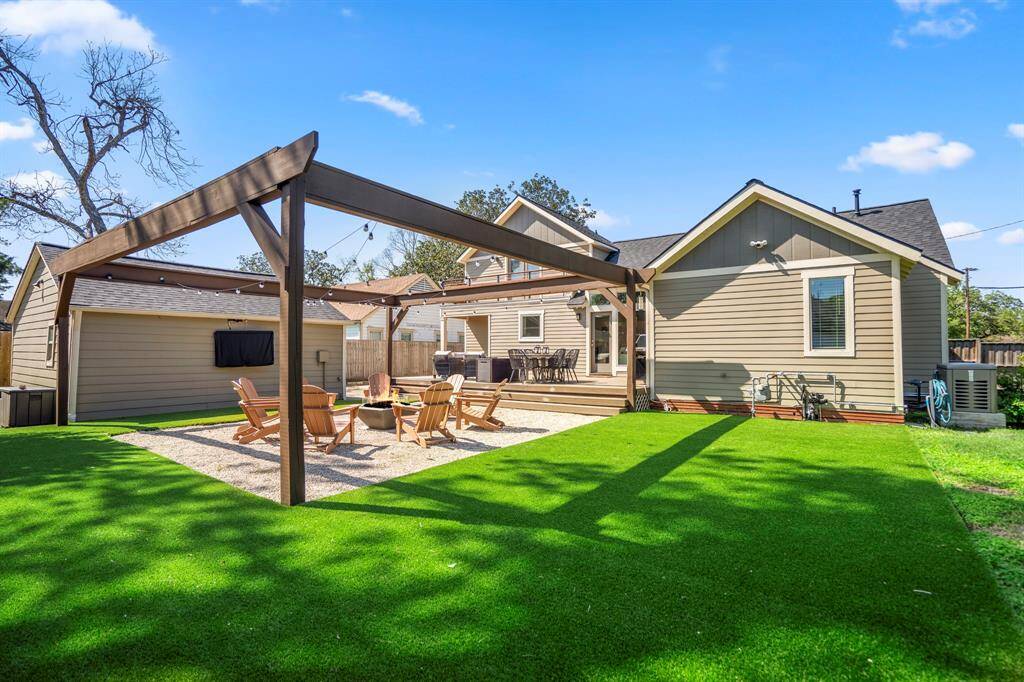 Striking curb appeal with fresh landscaping, lush turf, and a sleek new roof.