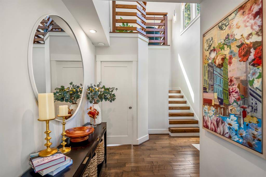 Designer finishes and recessed lighting elevate the modern yet cozy vibe.