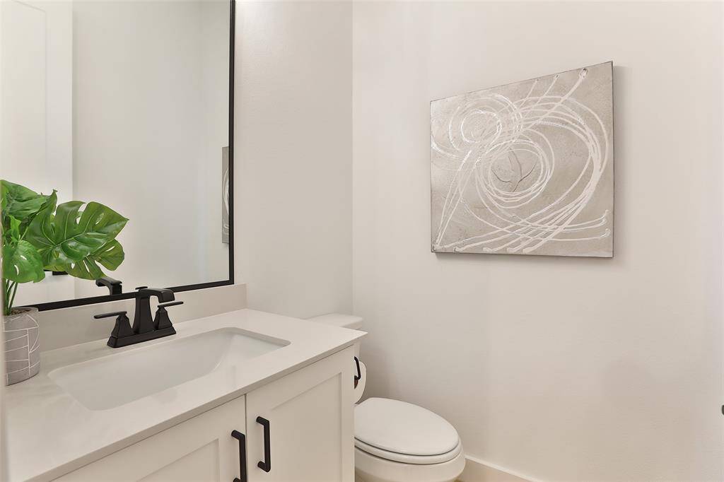 A convenient powder room for guests on the second floor.