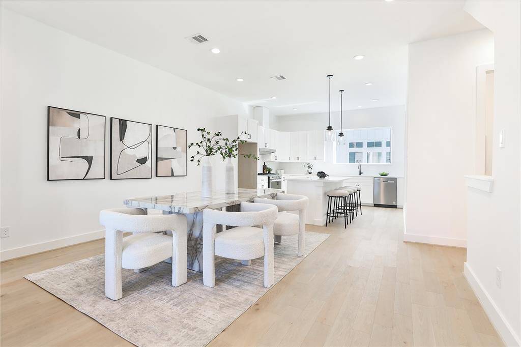 Picture yourself dining with friends and family in this spacious, open second-floor living area.