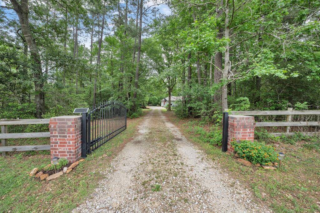1 Story Home on 4 Acres! So many trees give shade and privacy