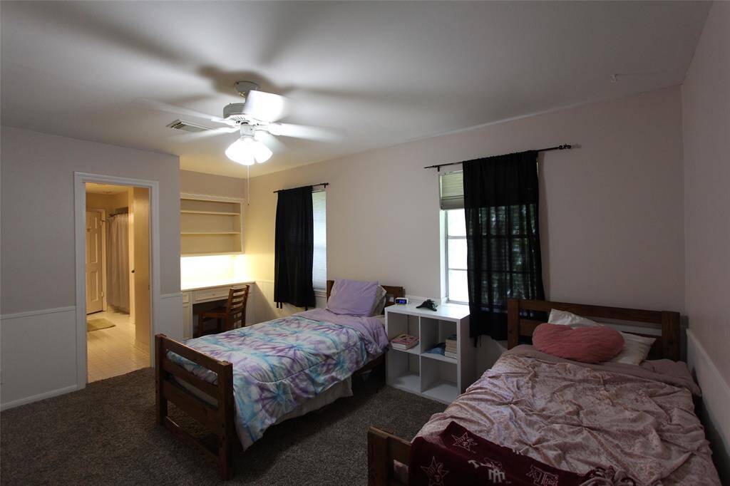 Bedroom 2 has a built in desk/vanity area