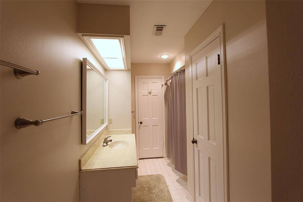Bath 1 upstairs links Bedroom 2 and 3