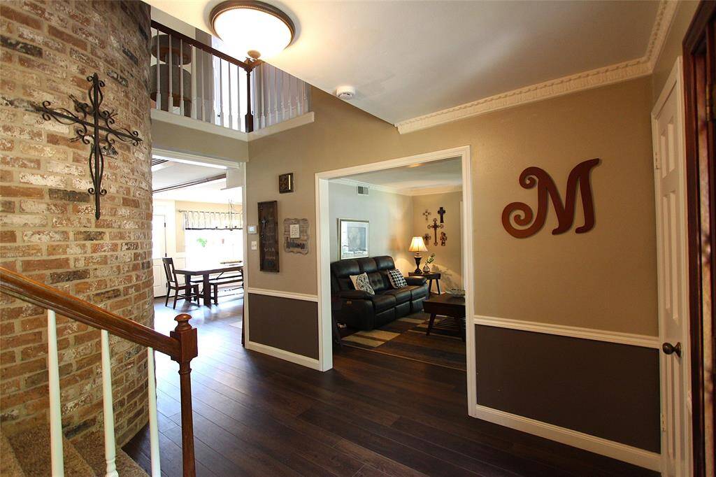 Large entry way with spiral staircase