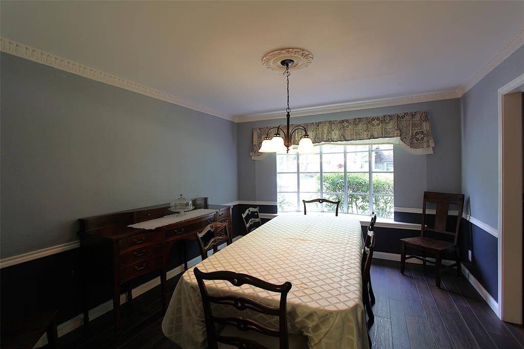 Formal dining with bay window