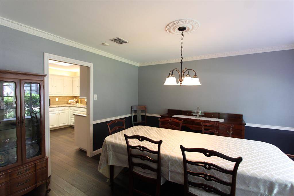 Formal dining room adjoins the kitchen for easy access