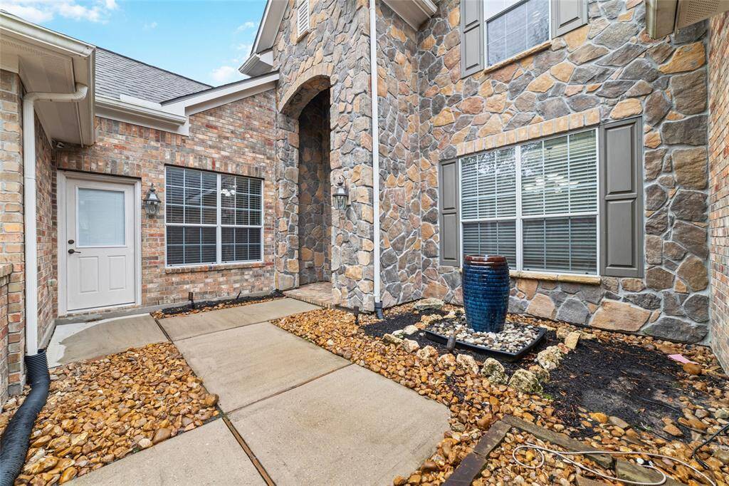 Front Doorway entrance and side garage entrance