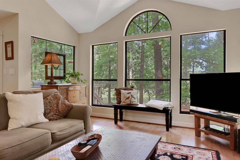 The wall of windows overlooks the water and allows in plenty of natural light