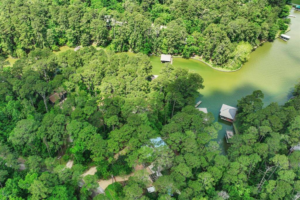 This waterfront home is nestled amongst the trees providing a secluded feel