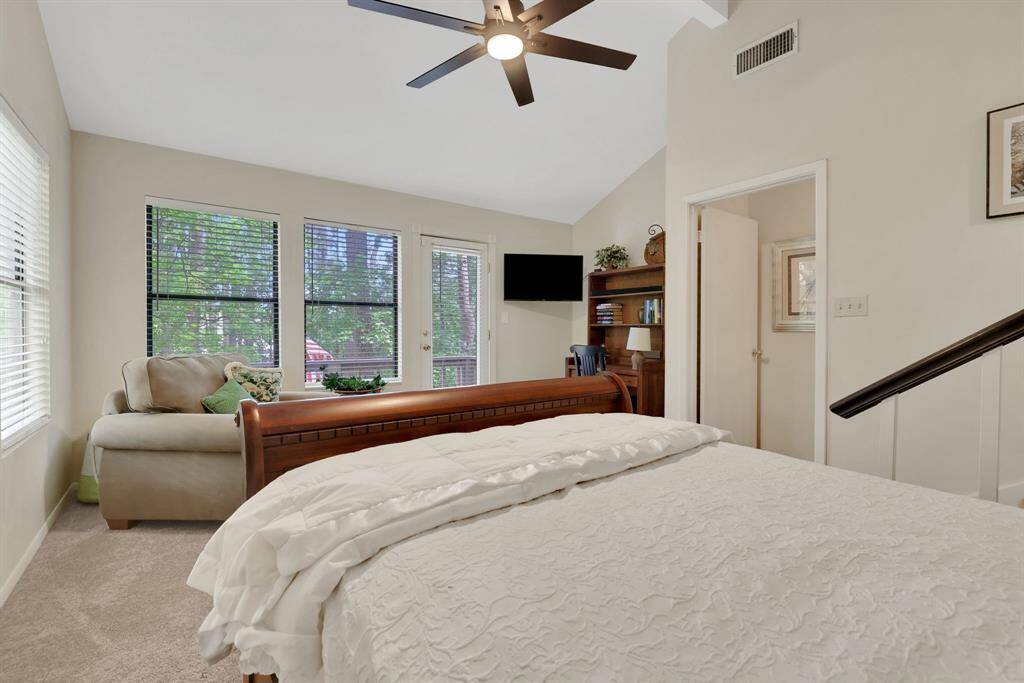 The primary bedroom has its own private balcony