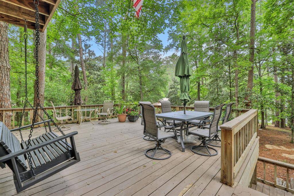 The spacious back deck is a great spot to hang out after a day on the lake