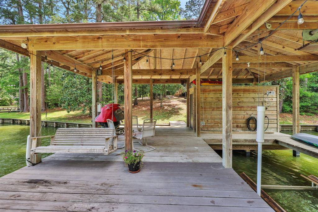 The boathouse also has a storage area for all the lake toys and swim platform