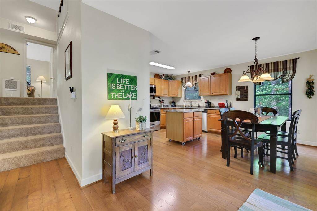 Entering from the back deck leads you into the kitchen/dining/living area