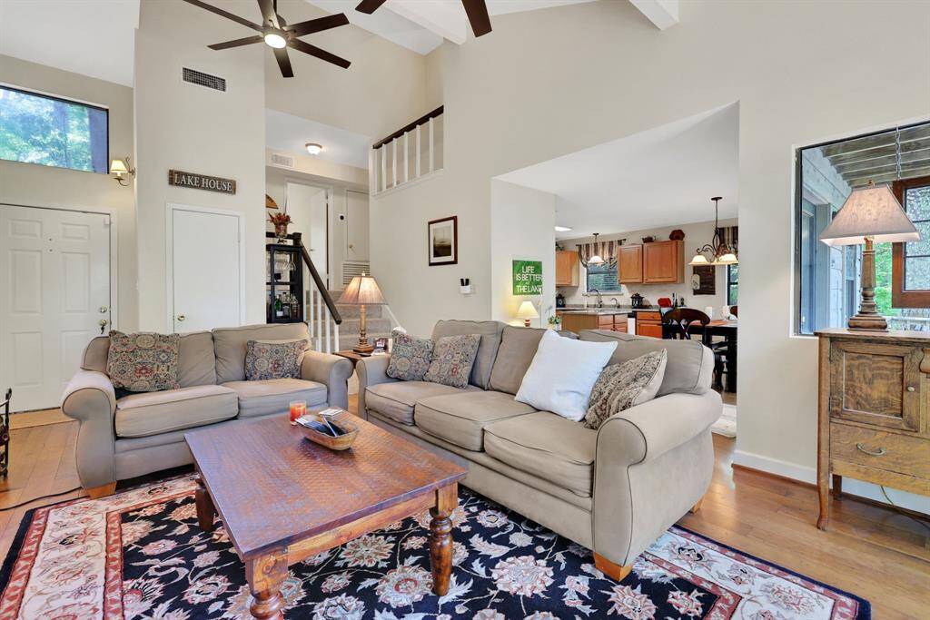 The living area has high vaulted ceilings