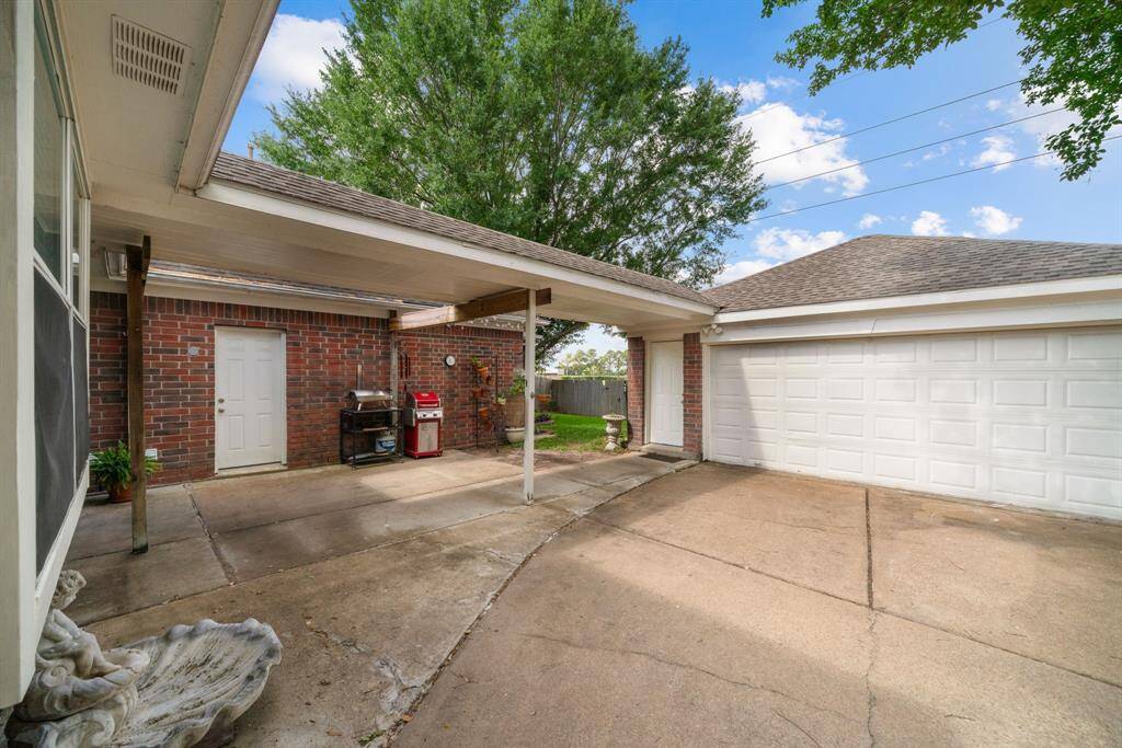Back Patio, Covered Walkway to Garage