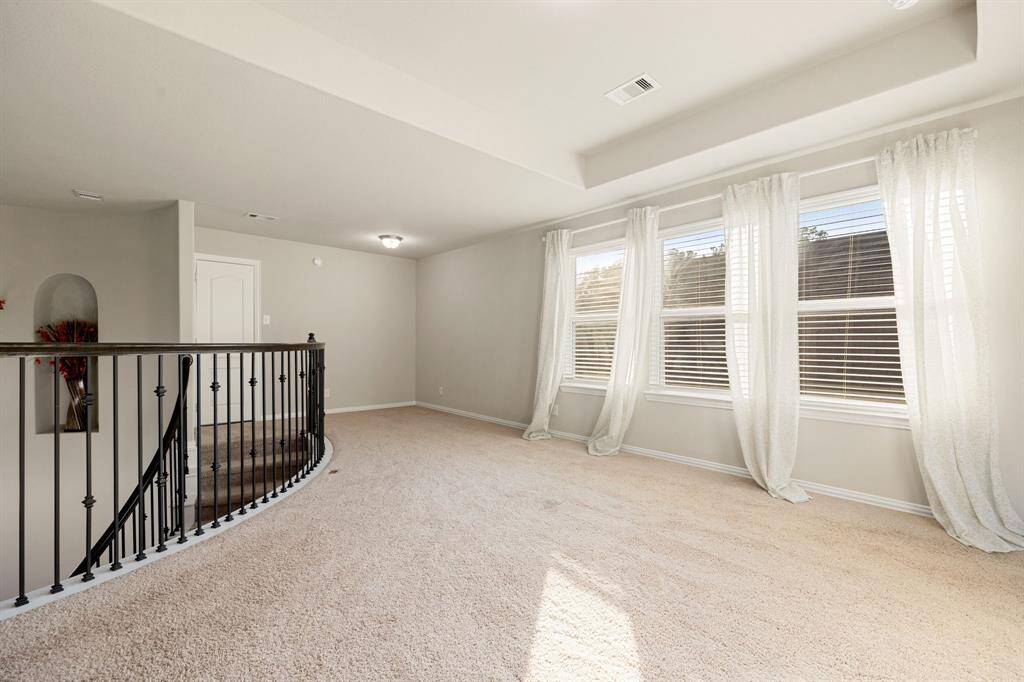 Perfect for entertaining is this amazing game room! Right upstairs this space would be a fabulous teen hangout, or adult game room