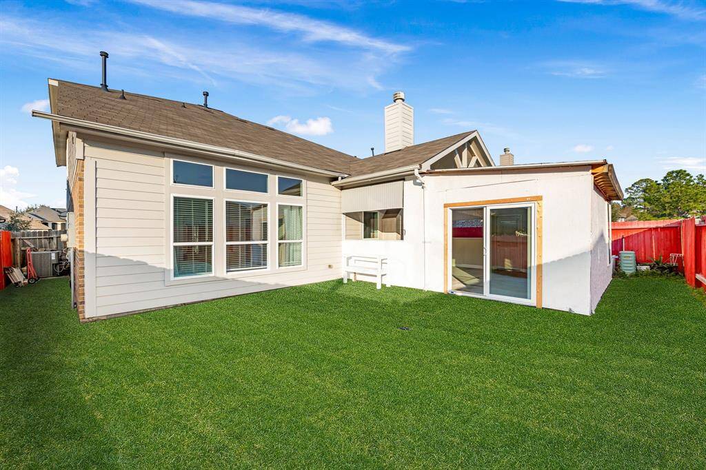 Virtually staged backyard with sod
