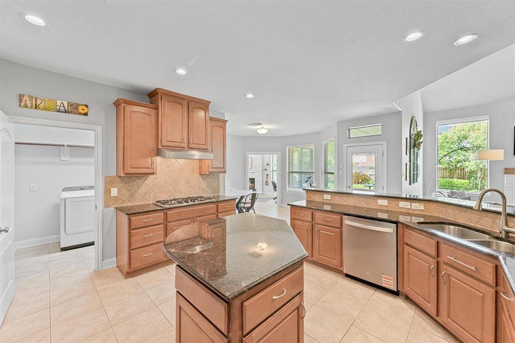 Let's take a look at a few highlights starting with the chef's kitchen. Enjoy abundant cabinetry for storage and organization in this space.