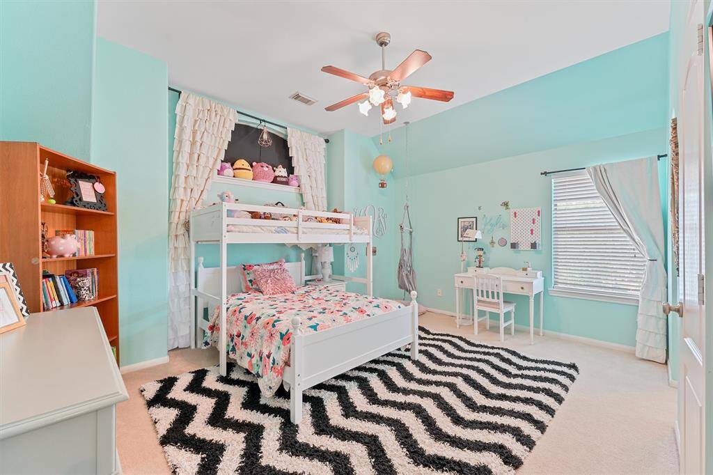 Bright and airy, this room offers plenty of space for homework, relaxing or surfing the web.