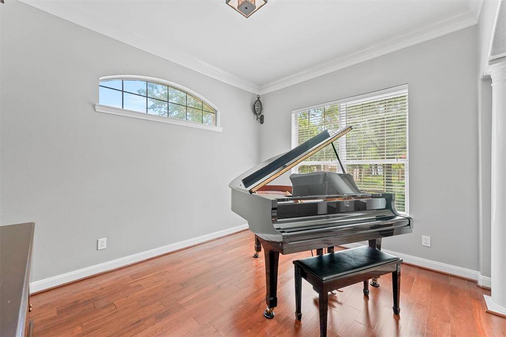 This formal living room is right off the entryway and is currently being used as a music room.