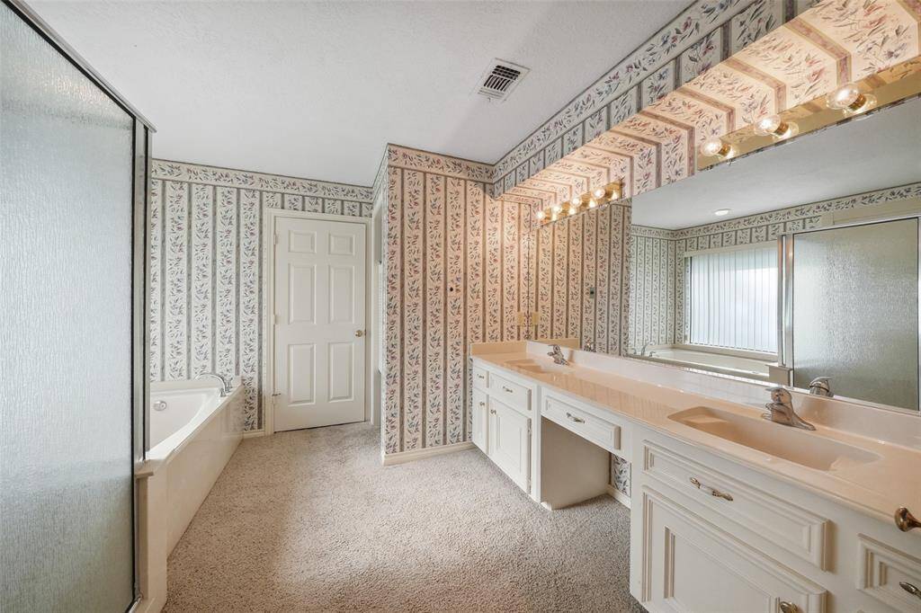 Primary bath with double vanity.