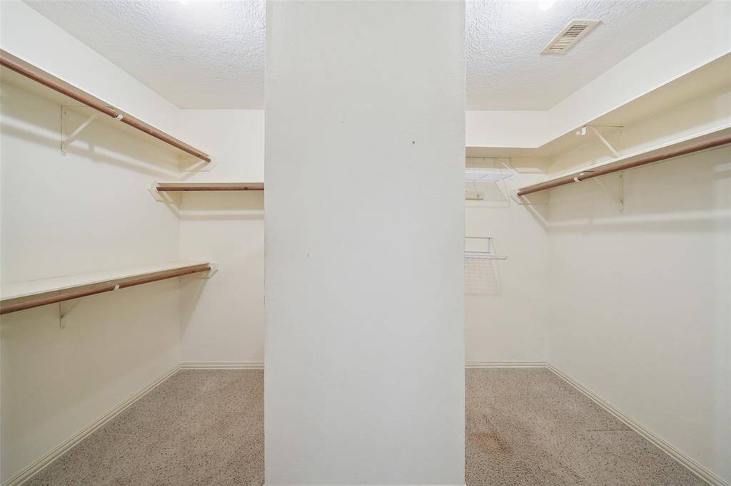 Walk-in closet in primary.