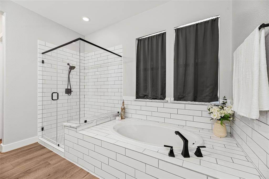 Relax in your deep soaking tub or opt for a quick rinse in the separate shower.