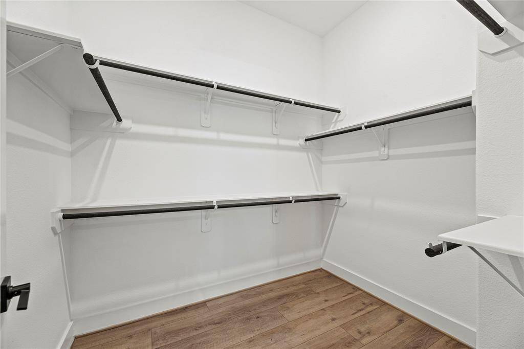The closet offers ample space to store all your clothes and keep everything organized.