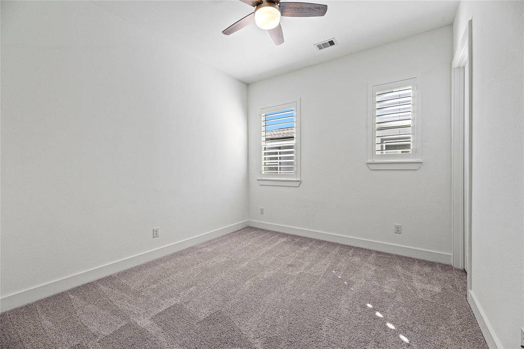 This delightful second bedroom is truly a canvas for your personal touch, ensuring it meets all your needs with style and ease.