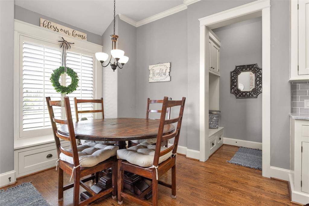 A charming breakfast nook bathed in natural light, ideal for casual meals or morning coffee with views of the backyard.
