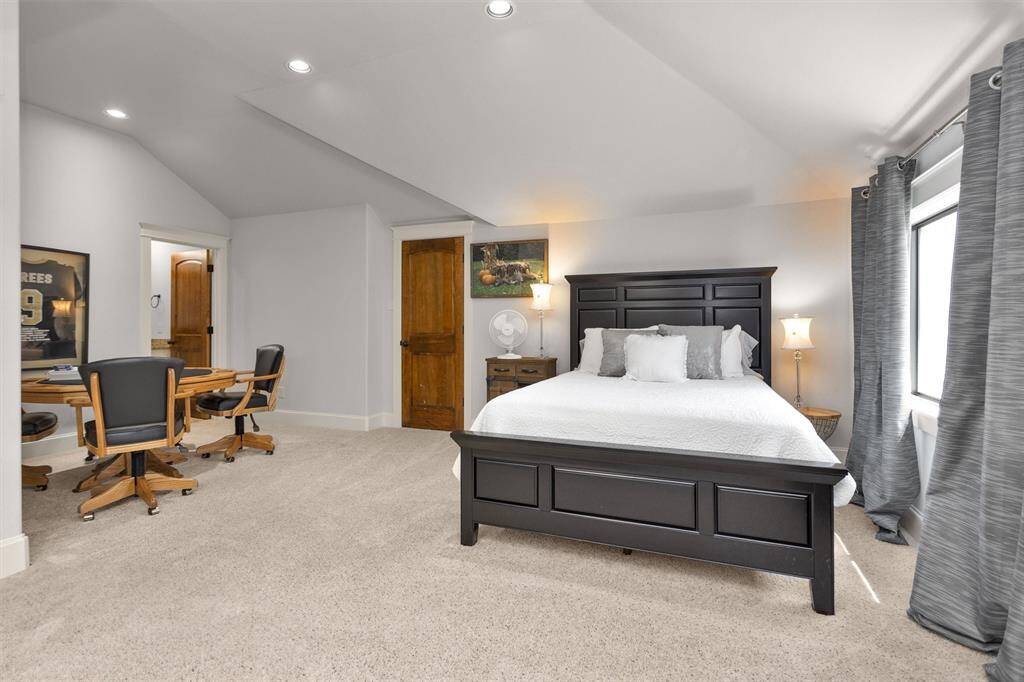 Versatile upstairs game room measuring 27x18, ideal for a media room, playroom, or second living area—endless possibilities.