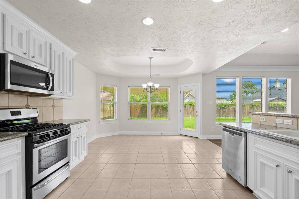 Kitchen view towards backyard.
