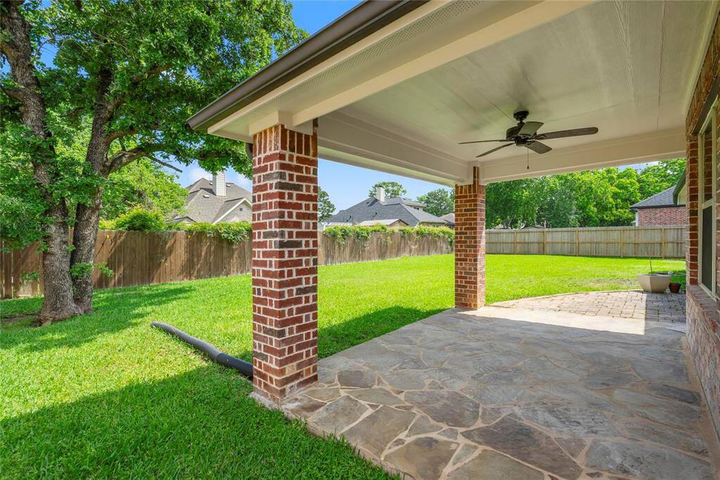 Patio with Plenty of Shade and Fan for Summer Days.