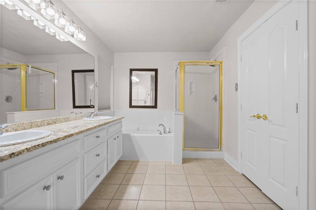 Double Sink, Separate Soaking Tub and Shower in Primary Bathroom