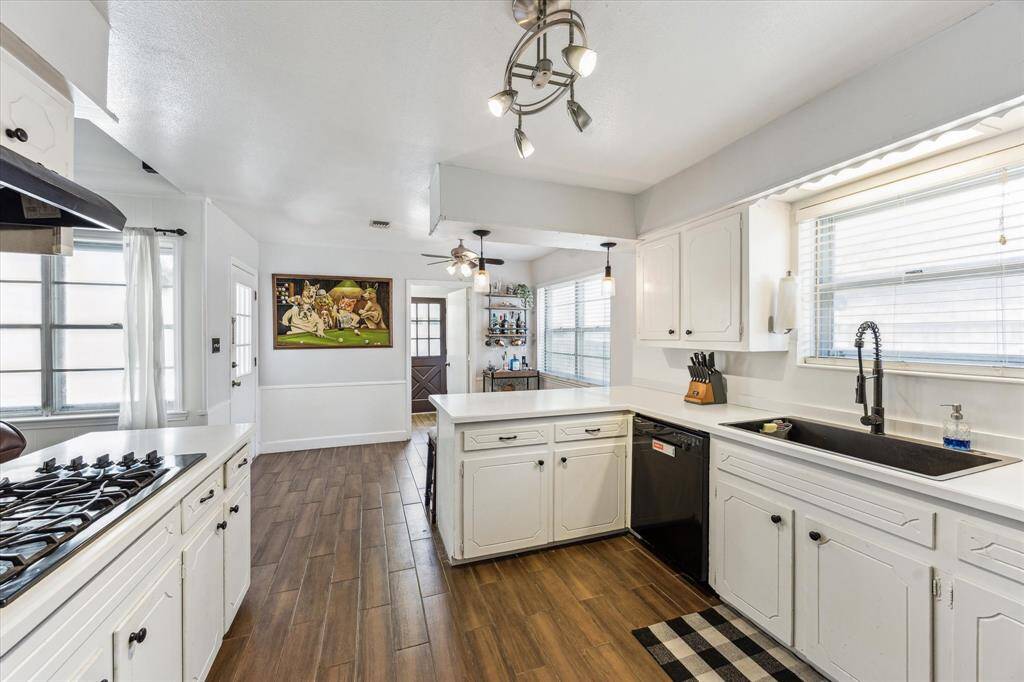 From this angle in the kitchen, you get a glimpse of the utility/mudroom just beyond the breakfast room.