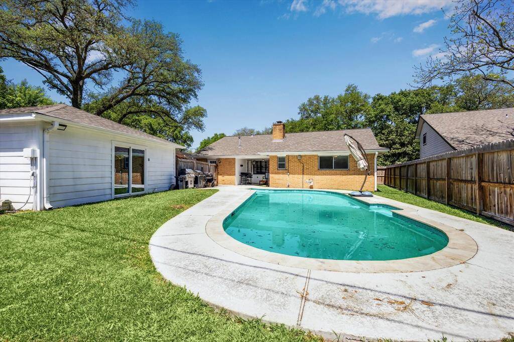The garage is equipped with sliding glass doors and full electrical capabilities. Add a mini-fridge, and you'll never have to step inside for a refreshing drink while lounging by the pool.