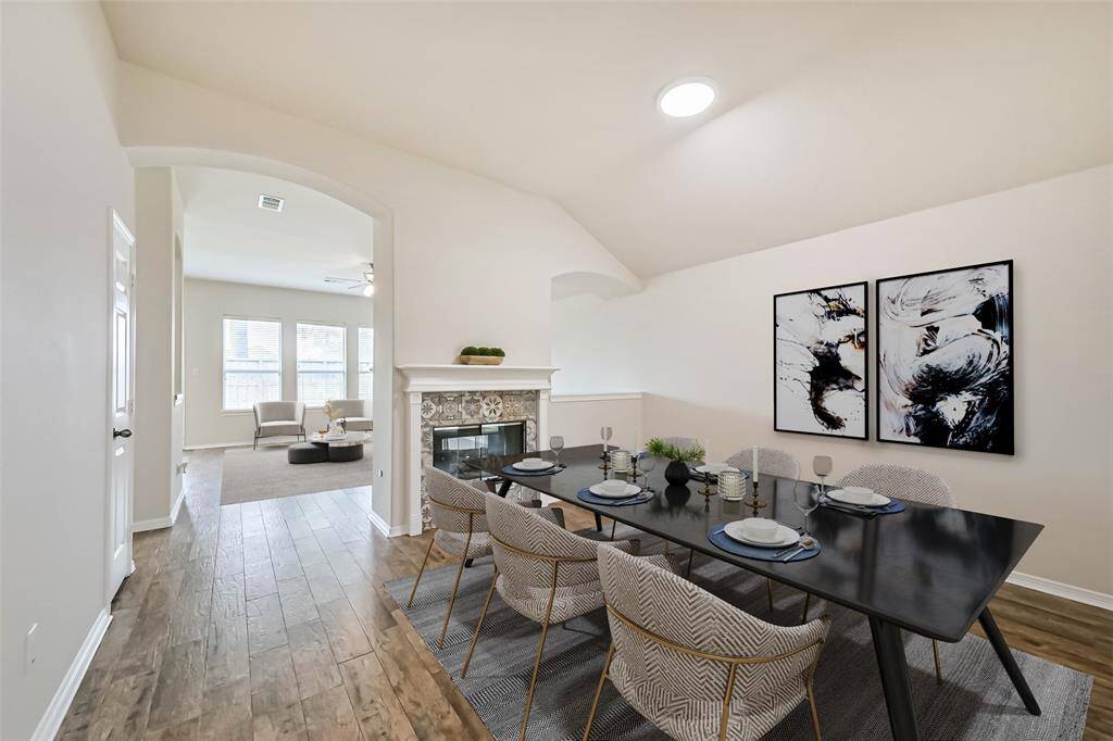 The dining area features a fireplace