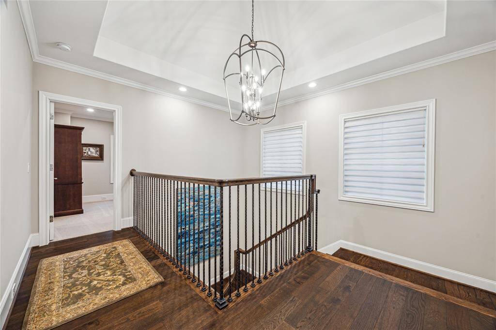 Landing area provides a seamless transition to the bedrooms and game room.