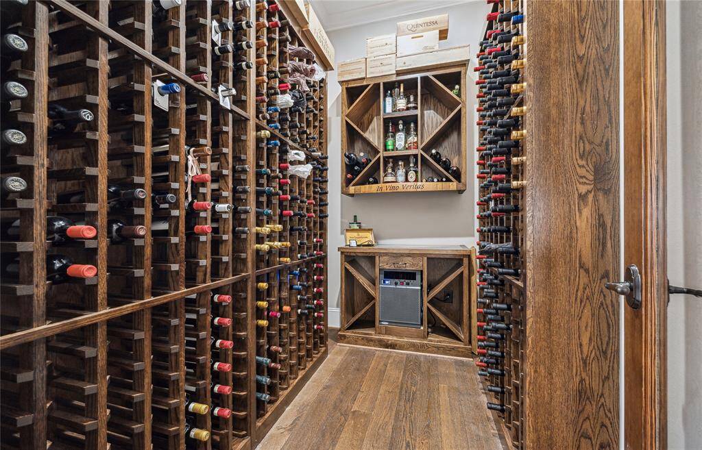The temperature-controlled wine room is true showpiece. Holds up to 700 bottles, enclosed in a beautifully finished space just off the butler’s pantry—perfect for the collector or entertainer.