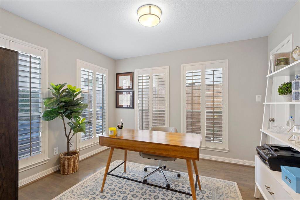 Home office located on first floor. This is separate from the three bedrooms this home offers.