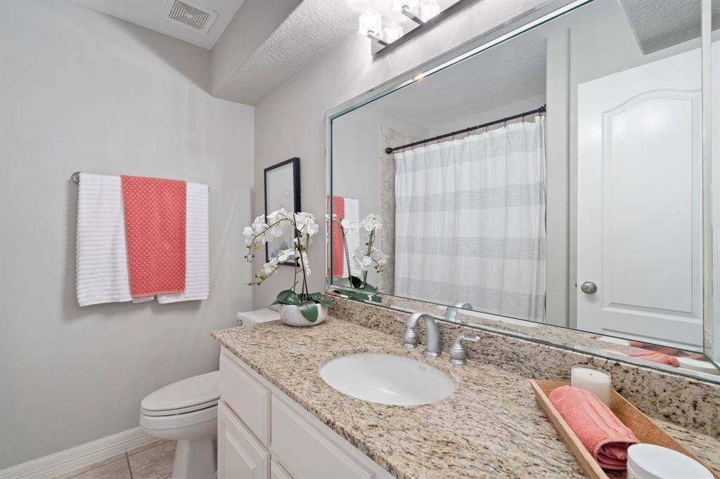 First floor bathroom with tub/shower combo.