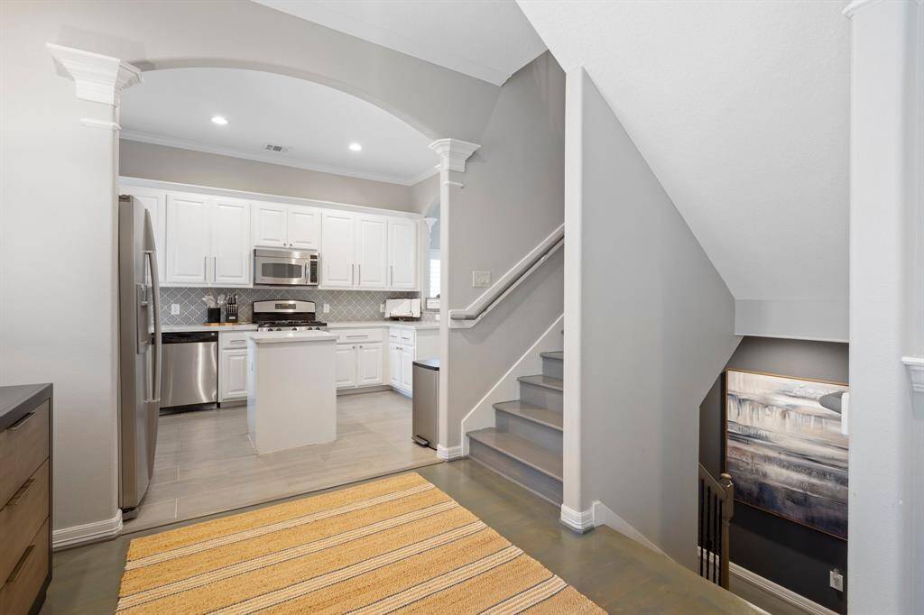 Second story landing is large and makes the space feel open and bright.