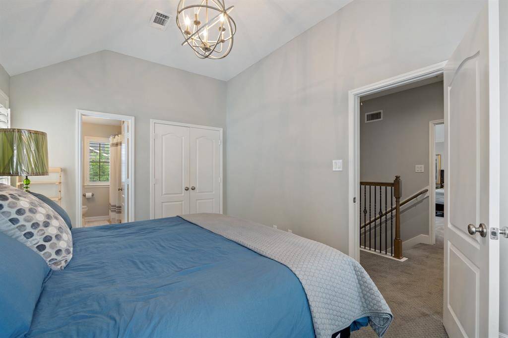 Secondary bedroom on third floor fits king size bed with room for exercise equipment!