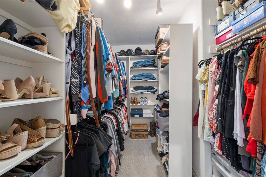 Large walk in closet in primary bedroom