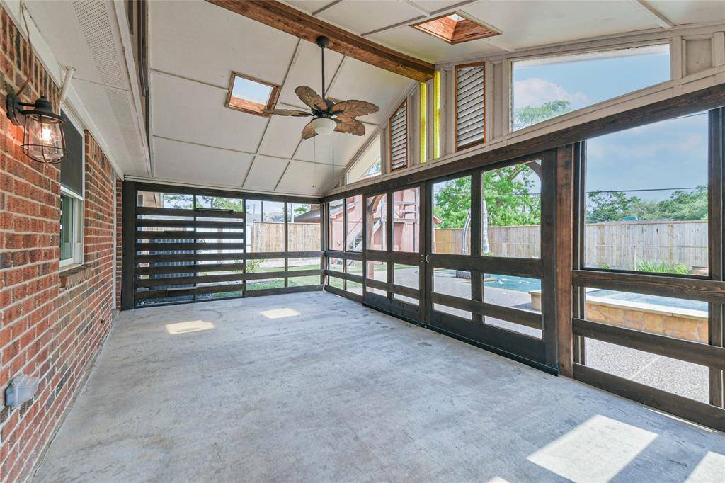 The screened in back patio was added during covid, providing a safe place for folks to visit.