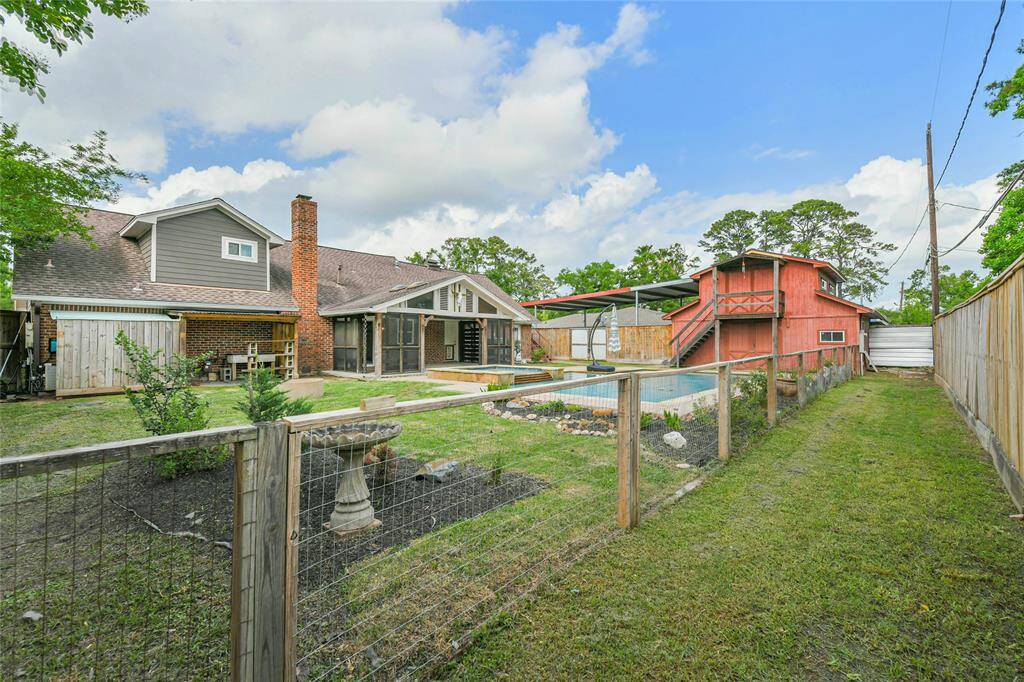 A dog run is set up in the backyard if you want it. This view shows you that it's not just the front of the house that has great curb appeal, but, the back does as well.