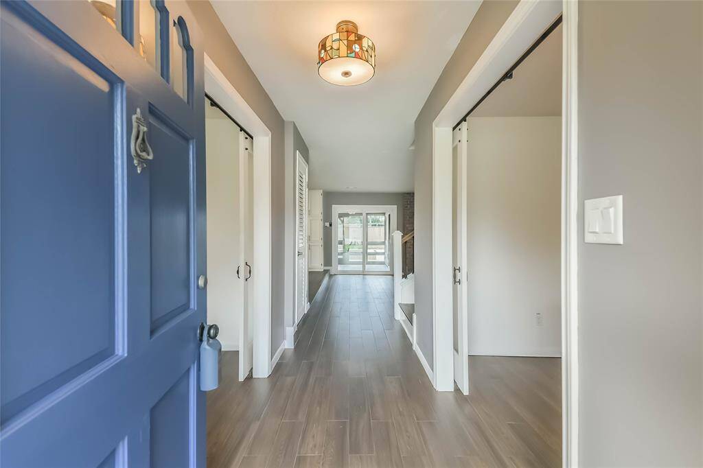 As soon as you enter the door you'll start saying wow! Fresh paint, updated tile "wood" floors, elegant lighting.