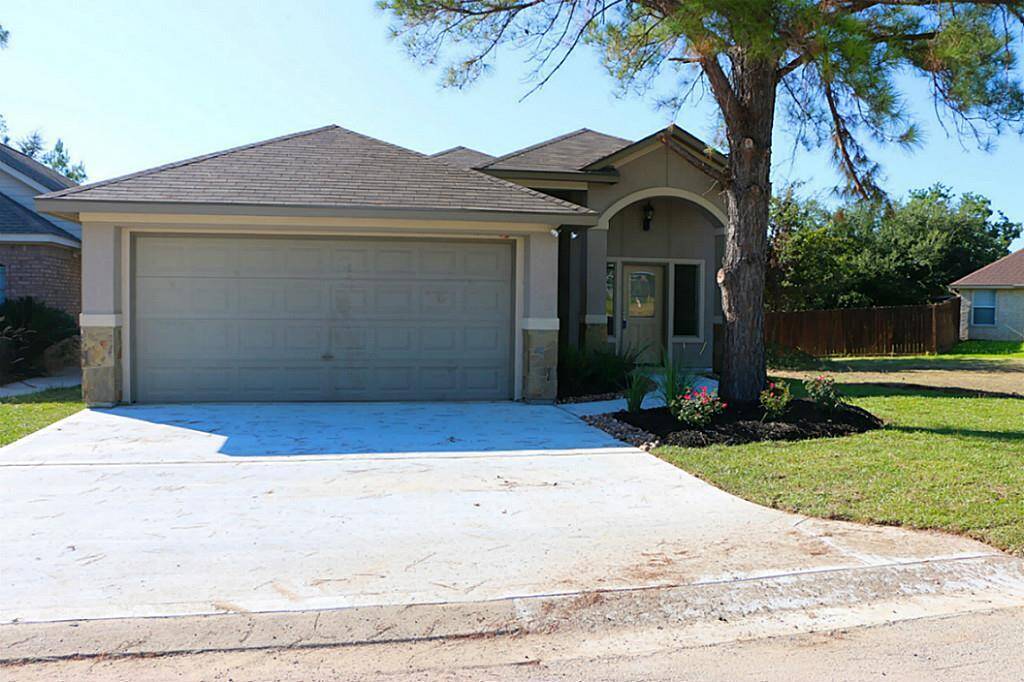 2 car garage with double wide driveway.