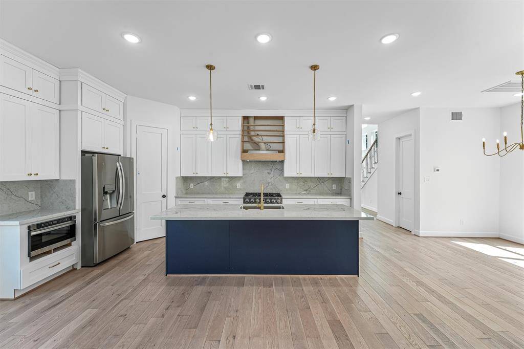 Another view of kitchen. (Over range hood cover to be installed very soon)